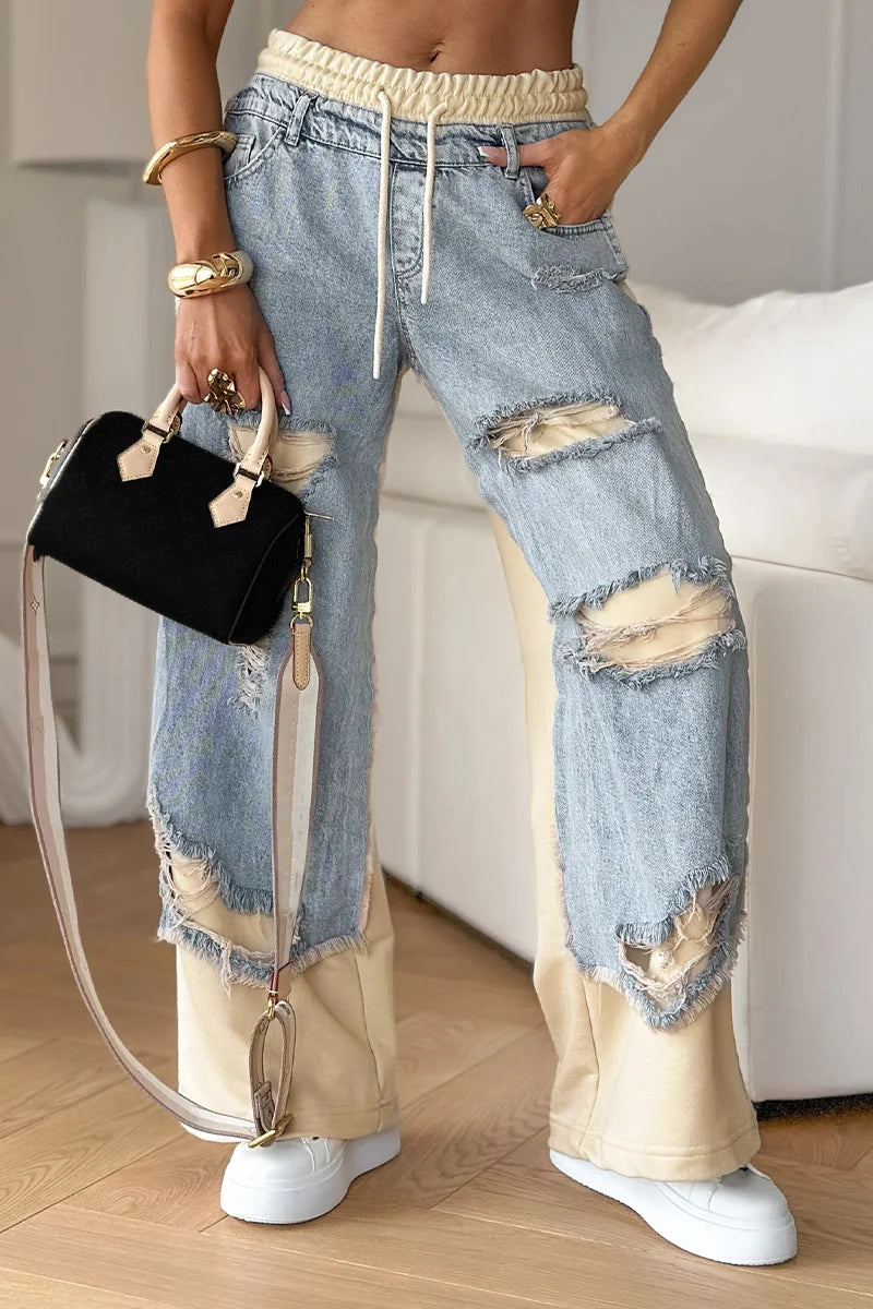 Pantalón con costuras y diseño roto